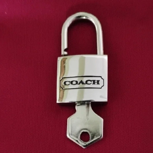 Coach Metallic Silver Key Lock - Picture 2 of 7
